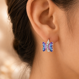 Cargar imagen en la galería, Aretes Mariposas Moradas Tornasol