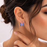 Cargar imagen en la galería, Aretes Mariposas Moradas Tornasol