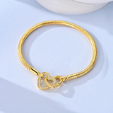 Cargar imagen en la galería, Brazalete Dorado Corazones Entrelazados