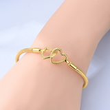 Cargar imagen en la galería, Brazalete Dorado Corazones Entrelazados