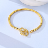 Cargar imagen en la galería, Brazalete Dorado Corazones Entrelazados